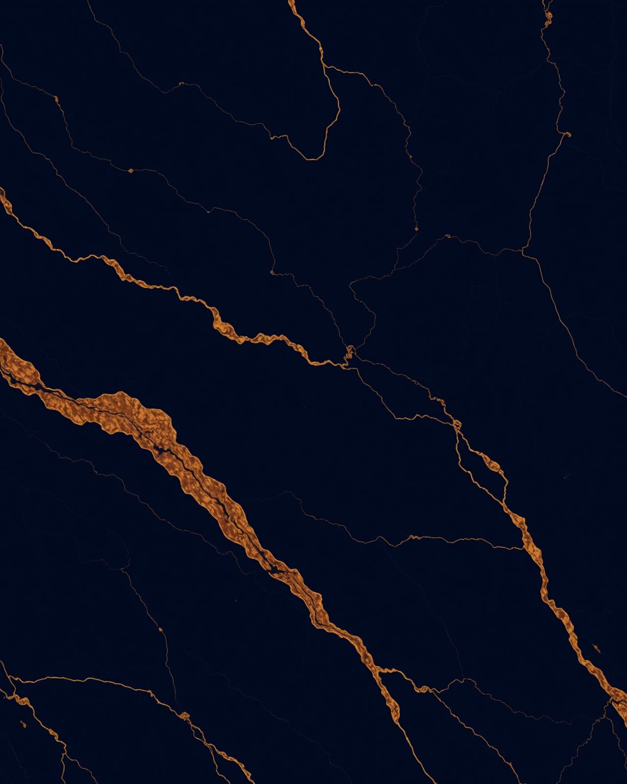 Deep navy surface with warm gold veins
